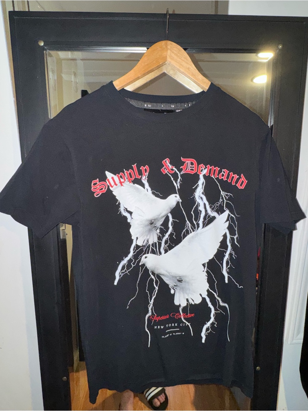 Black Short-Sleeve Graphic Tee with White Dove Design